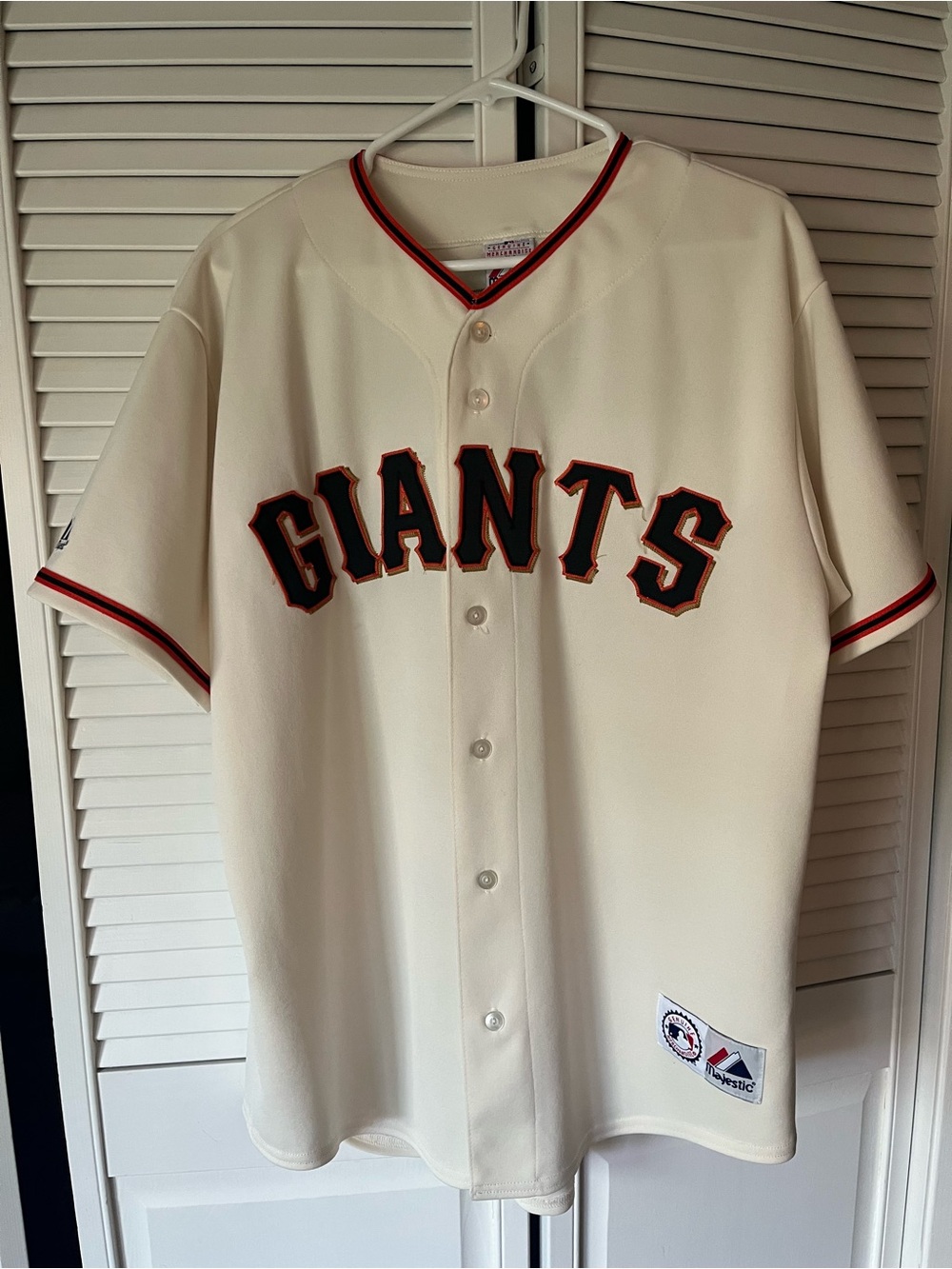 Genuine Merchandise Cream Jersey with Black and Orange Trim